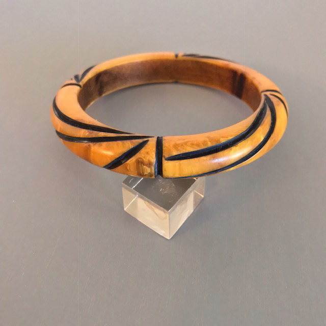 BAKELITE bangle in marbled bamboo, over dyed and black resin washed and in the line carved style
