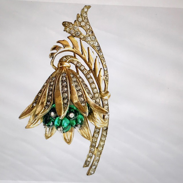 DEJA flower brooch with green faceted beads as stamen, each with a clear rhinestone center