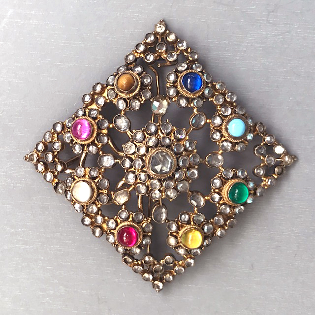 GEM STONE lovely and unusual brooch/pendant combination with multi-colored semi-precious cabochons, natural zircons, red cabochon is a synthetic ruby,  aqua, green glass cabochons, synthetic blue spinel, tiger’s eye, synthetic sapphires