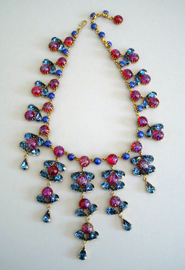 SPECTACULAR NECKLACE, a rare one made of rose and blue colored rhinestones, the combination of Dragon’s breath-like cabochons with dimples
