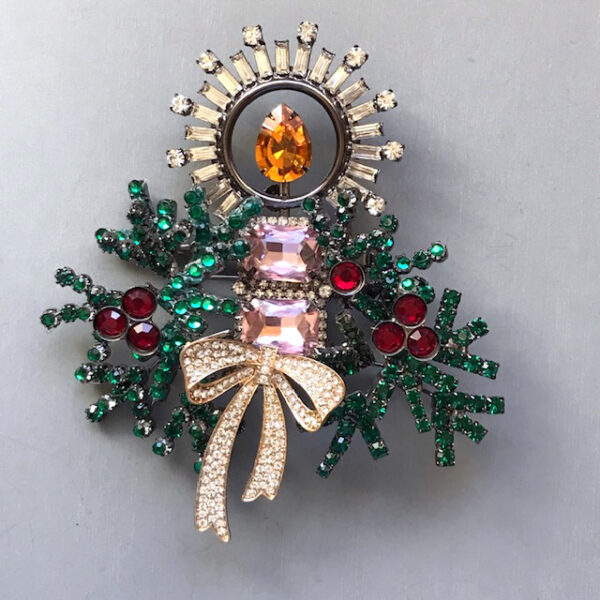 LARRY VRBA festive Christmas candle, holly berries and evergreens brooch. The candle is made of pink rhinestones