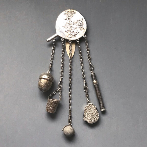 CHATELAINE Victorian antique sterling silver chatelaine with an Asian or Japonesque style fan top and five different tools, 1888