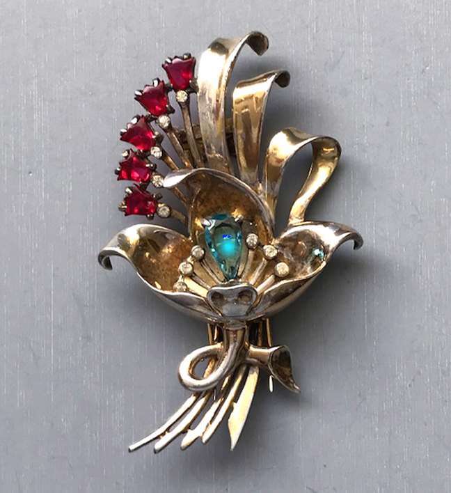 DEROSA flower and ribbons fur clip with red tulip shaped rhinestones, an aqua teardrop shaped rhinestone center and clear rhinestone stamen