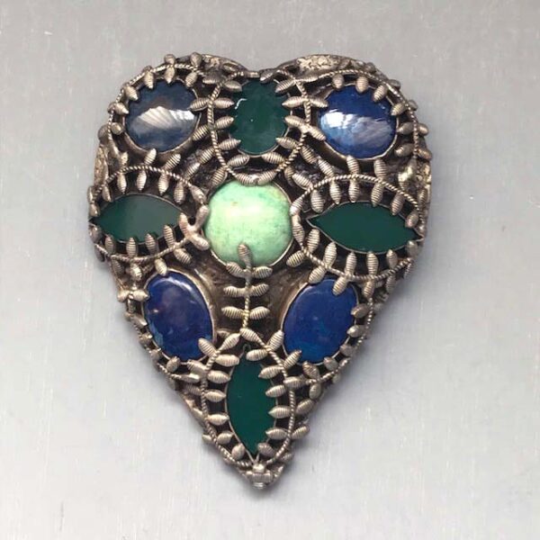 DEROSA heart shaped dress clip with unusual blue and green glass disks and low profile cabochons in a silver tone metal setting