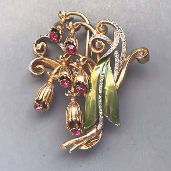 DEROSA style flower brooch with pink rhinestone flower centers and clear rhinestone accents, intertwined design