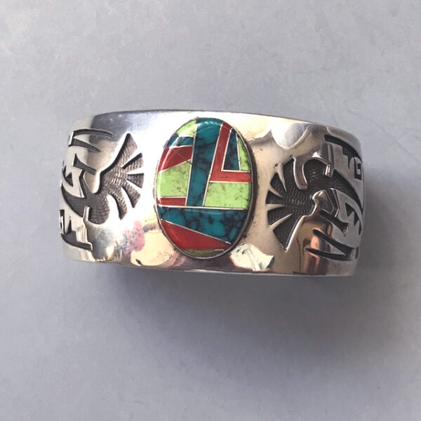CHARLIE BOWIE Native American  sterling silver bracelet with turquoise, gaspeite and coral inlay, and an overlay Kokopelli