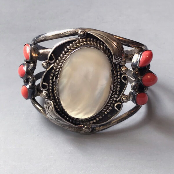 NATIVE AMERICAN mother-of-pearl and coral sterling silver bracelet with a leaf design on each side