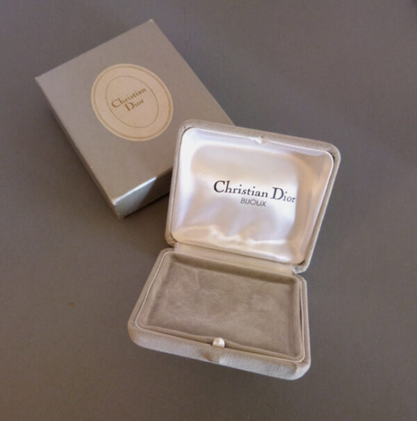 DIOR soft gray velvet covered hinged jewelry box with a cream satin lining