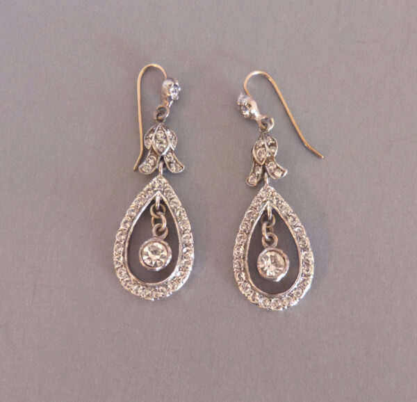 BRILLIANT clear rhinestone or paste pendant style earrings for pierced ears, set in silver with gold shepherds shaped wires, circa 1910 European