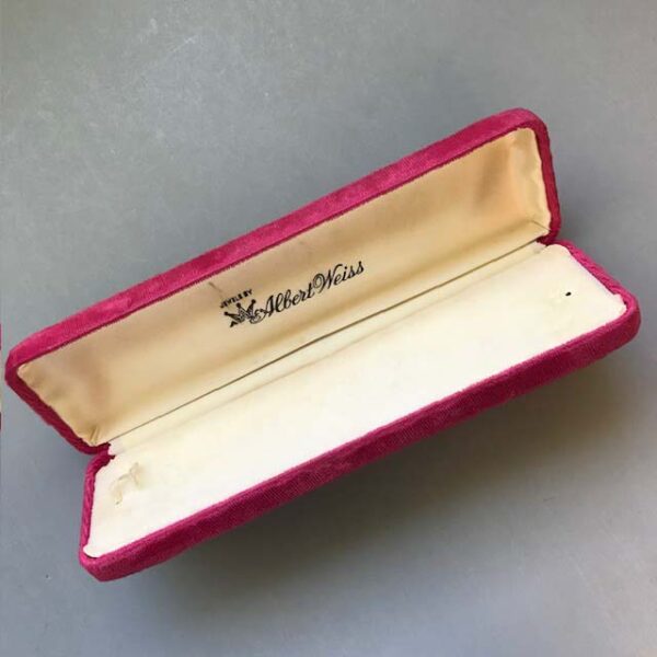 WEISS shocking pink velvet covered metal jewelry box, hinged and lined in cream colored satin and velvet