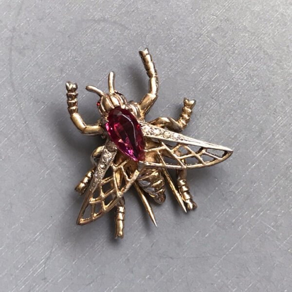 DEROSA fly or bee fur clip with a rose red body and clear rhinestones in a gold plated sterling silver setting