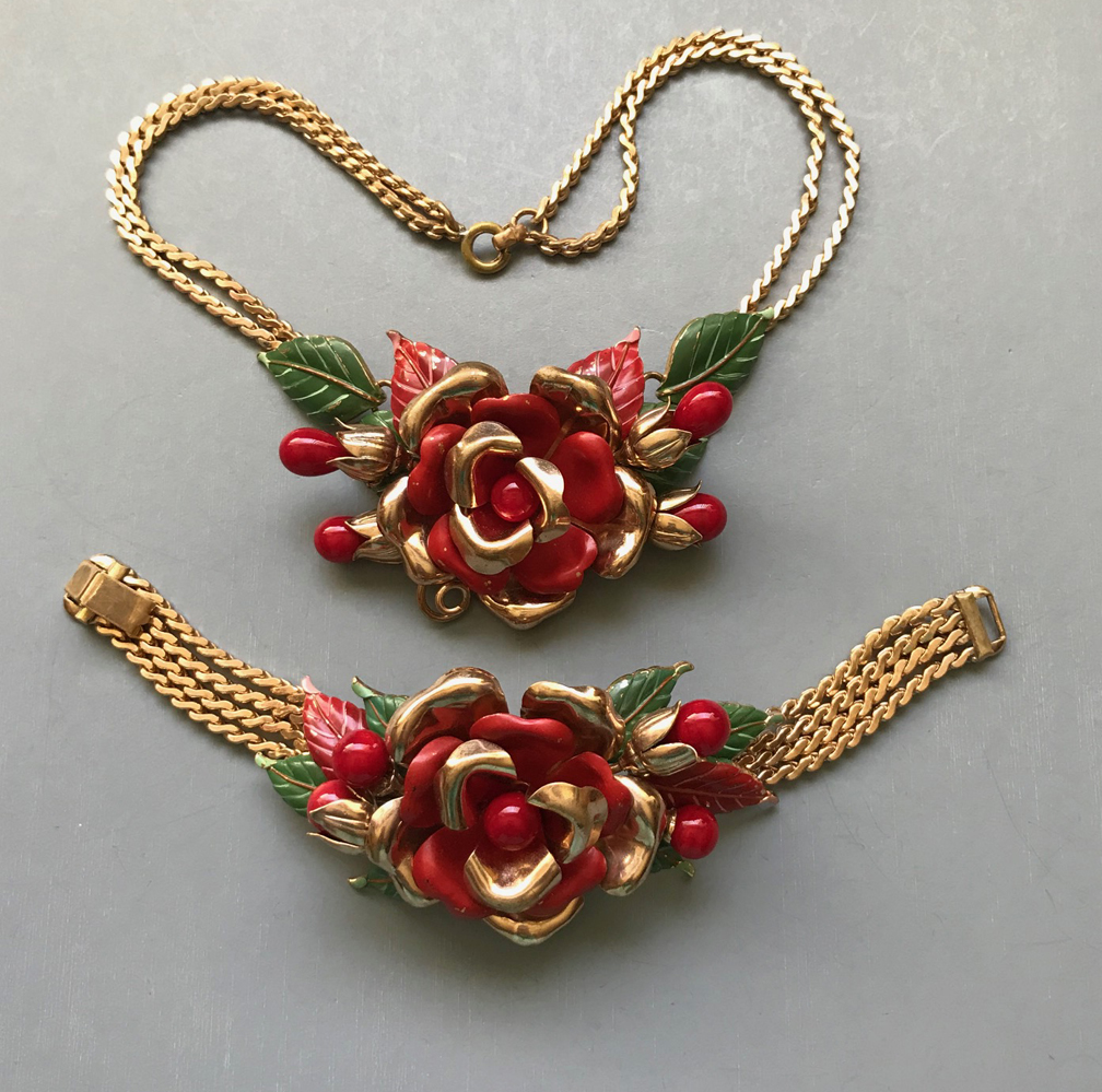 TRIFARI necklace and bracelet with red enameled flowers, green leaves and red glass beads