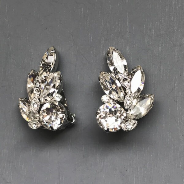 EISENBERG earrings in sparkling clear rhinestones set in a rhodium plated silver finish