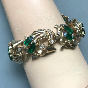 DEROSA bracelet with emerald green baguette and clear rhinestones in a gold plated sterling silver setting