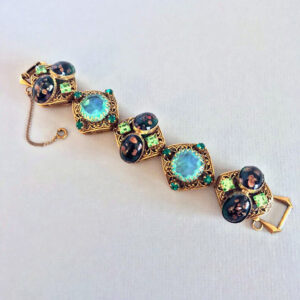 BRACELET of gold flecked green glass cabochons and rhinestones in this marvelously chunky bracelet