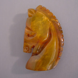 BAKELITE carved horse head brooch in swamp green beautifully marbled with caramel