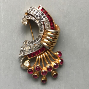 DEROSA sparkling red and clear rhinestone fur clip in a gold plated setting,1940s