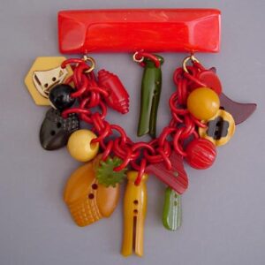 SHULTZ bakelite and plastic buttons and charms brooch, 2006