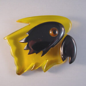 SHULTZ bakelite apple juice and black parrot head brooch, rare piece